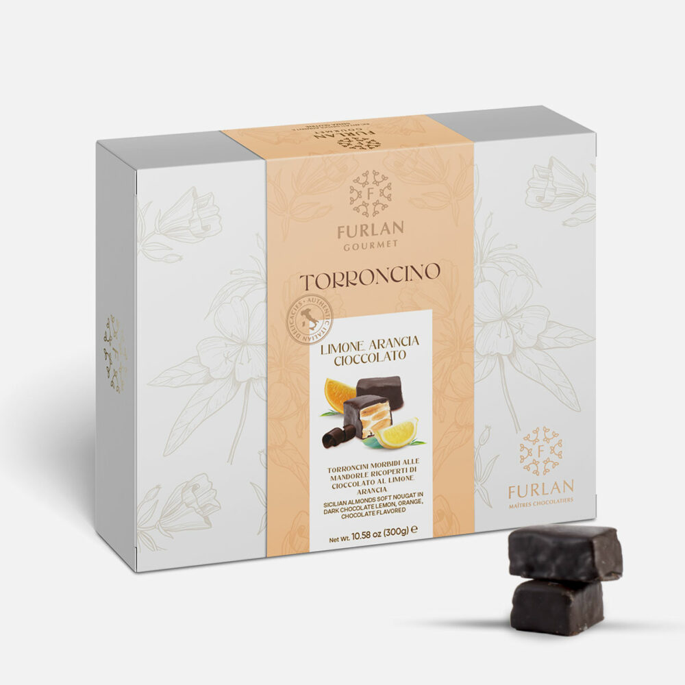 Torroncini morbidi alle mandorle ricoperti di cioccolato al limone e all'arancia