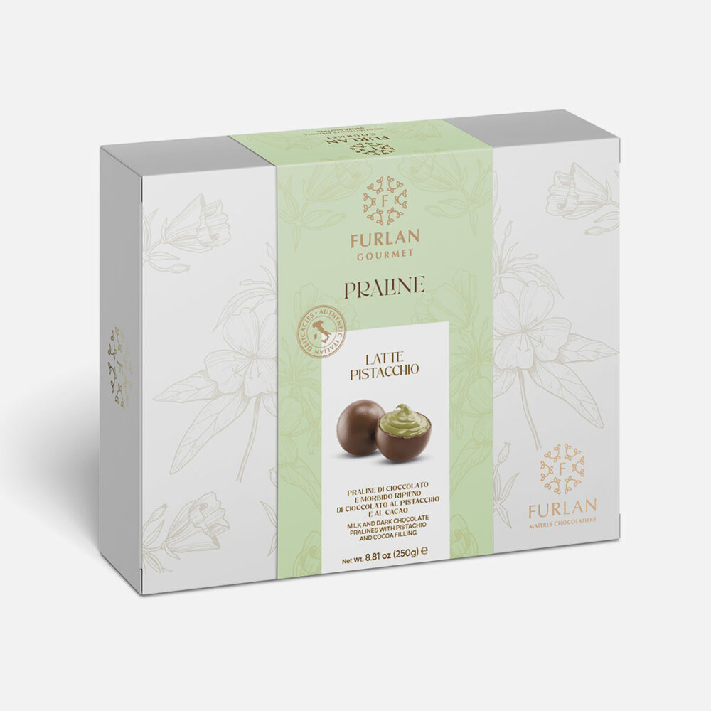Praline di cioccolato al latte e morbido ripieno al cioccolato bianco al gusto pistacchio