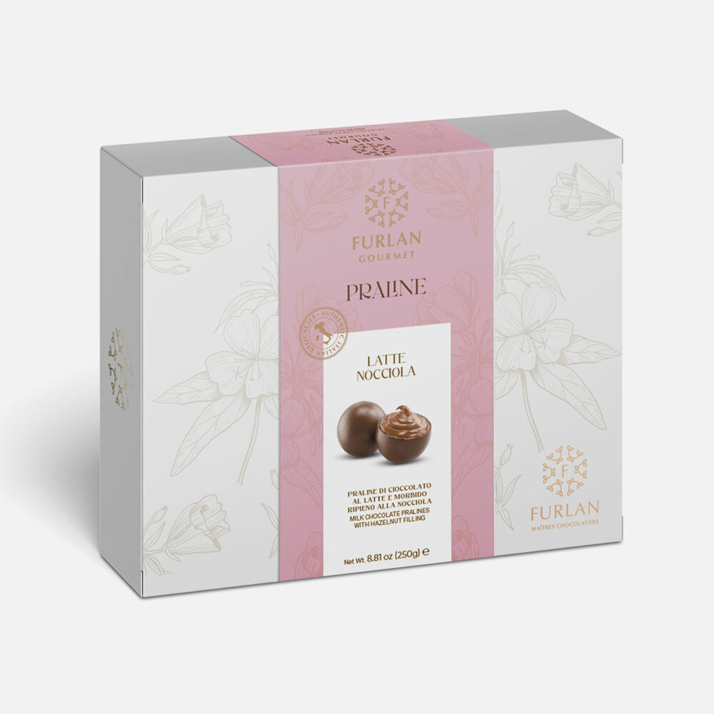Praline di cioccolato al latte e morbido ripieno alla nocciola